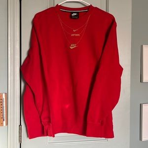 Nike crewneck with gold embroidery